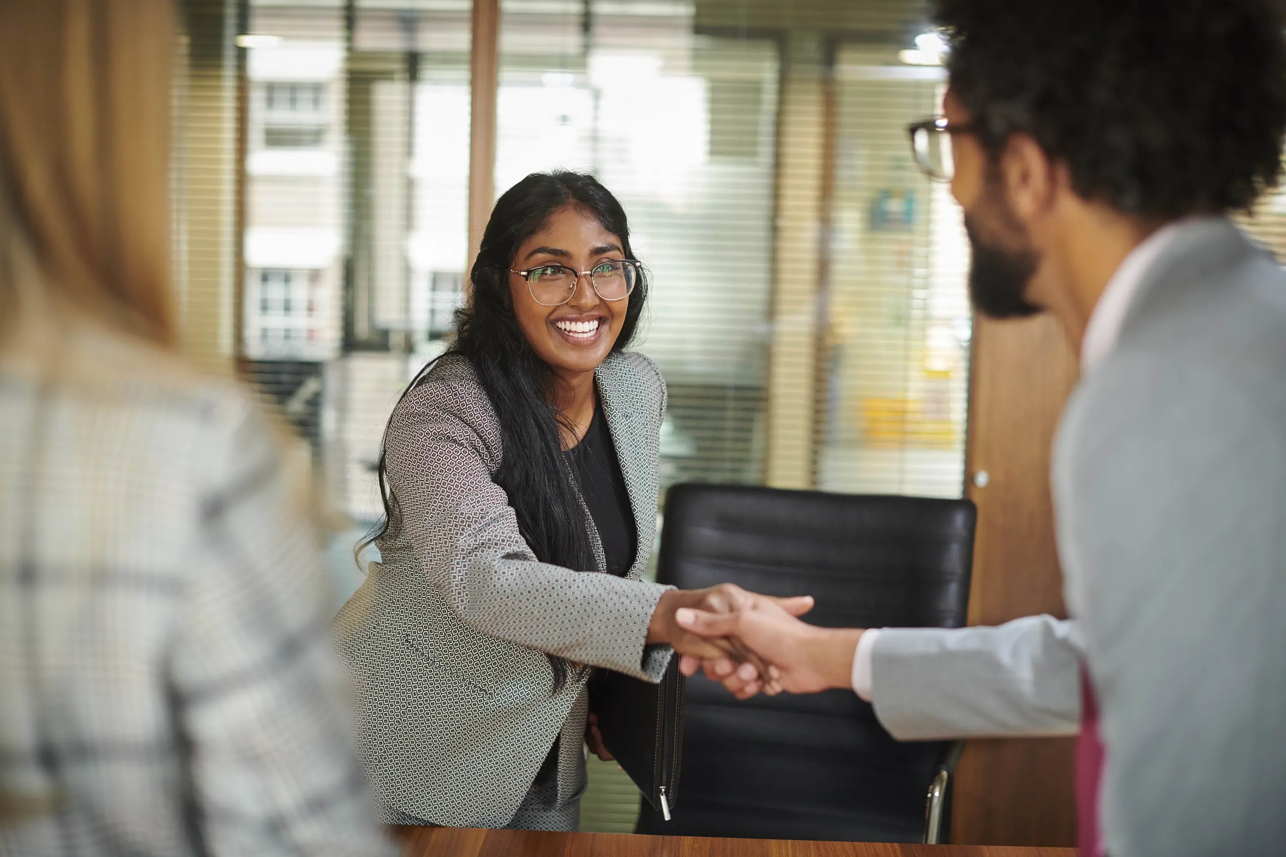 quality-candidate-shaking-hands