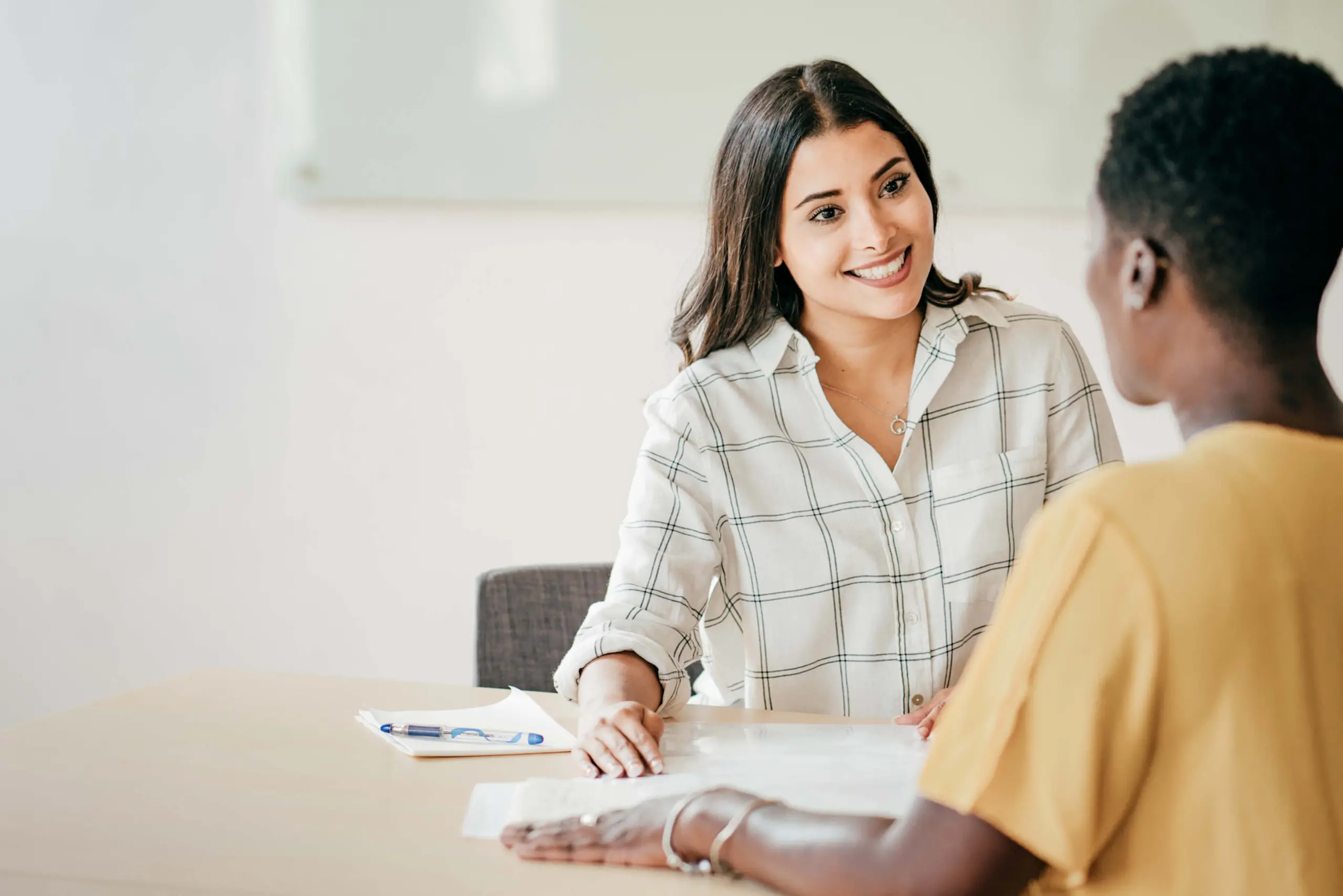 hiring manager speaks with job candidate